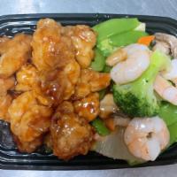 Dragon & Phoenix · Spicy. Shrimp mixed with Chinese vegetables and chunk chicken fried in spicy sauce.