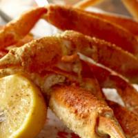Snow Crab Legs · Crab legs served with suspended butter and lemon. I lb, 520 cal.