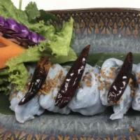 Thai Veggie Dumpling (V) · Cabbage,carrot, shiitake mushrooms ,Jicama and Chive served with sweet soy sauce. Vegetarian.