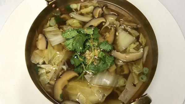 Tom Juad Puk · Napa cabbage, shiitake mushrooms, tofu skin, cilantro and scallion in clear broth. Vegetarian.