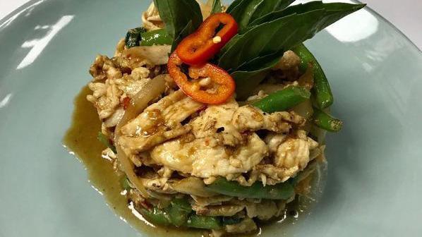 Pad Krapraw · Medium spicy basil, Thai chili, string beans, onion, long chili and basil leaves.