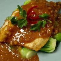Praram · Peanut sauce. Sauteed batter fried meat with peanut sauce and steamed baby bok choy.