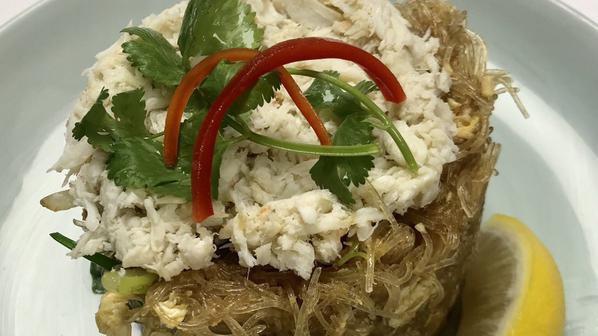 Pad Woosen Poo · Crab vermicelli. Crab meat, glass noodles, onion, scallions, Chinese celery and egg.