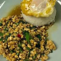 Krapraw Gai Sub · Minced chicken, chili, long chili, string bean and Thai basil topped with fried egg. Medium ...