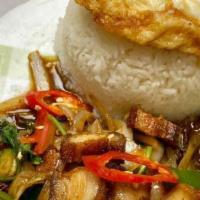 Krapraw Moo Krob · Medium spicy, crispy pork belly, chili, Thai basil leaves topped with fried egg.