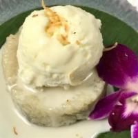 Kao Tom Mud · Banana wrapped in sweet sticky rice served with coconut ice cream.