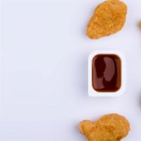 Chicken Nuggets · 10 pieces. Deep-fried juicy and golden chicken nuggets.
