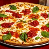 12 In Margherita · Personal. Fresh mozzarella, plum tomatoes, basil, and olive oil.