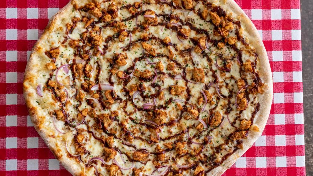 Bbq Chicken Pizza · White meat chicken, red onions, mozzarella and BBQ sauce.