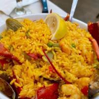 Paelha Valenciana · Seafood Combination w/ Lobster, Mussels, Clams, Shrimp, Scallops, Portuguese Sausage & Bonel...