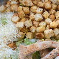 Caesar Salad · Romaine lettuce, croutons, parmesan cheese, and grill chicken.