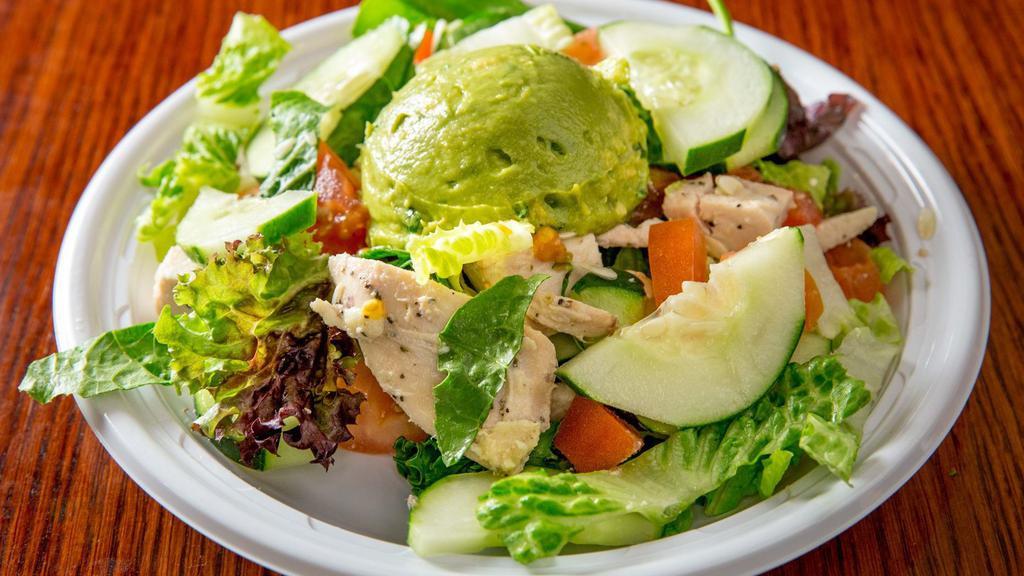 Chicken & Guacamole Salad · Lemon chicken breast over cool salad with guacamole. All salads come with Romaine mix, cucumbers, tomatoes and are mixed with a dressing of your choice.