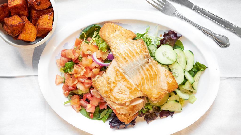Salmon Salad · Delicious salmon grilled to perfection. (Salmon is served plain, can be cooked with Cajun or teriyaki sauce upon request.) All salads come with Romaine mix, cucumbers, tomatoes and are mixed with a dressing of your choice.
