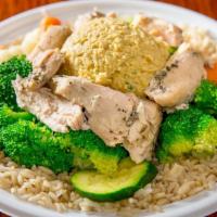 The Ultimate Plate · Lemon chicken breast, brown rice, mixed steamed vegetables and hummus. we suggest salsa verd...