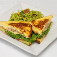 Pear Grilled Cheese · pears, arugula, brie, tomato & fig aioli on toasted challah, served with house salad or hand...