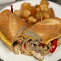 Chicken Cheesesteak · grilled chicken, potatoes, peppers, onions, jalapenos, american cheese, served on baguette (...