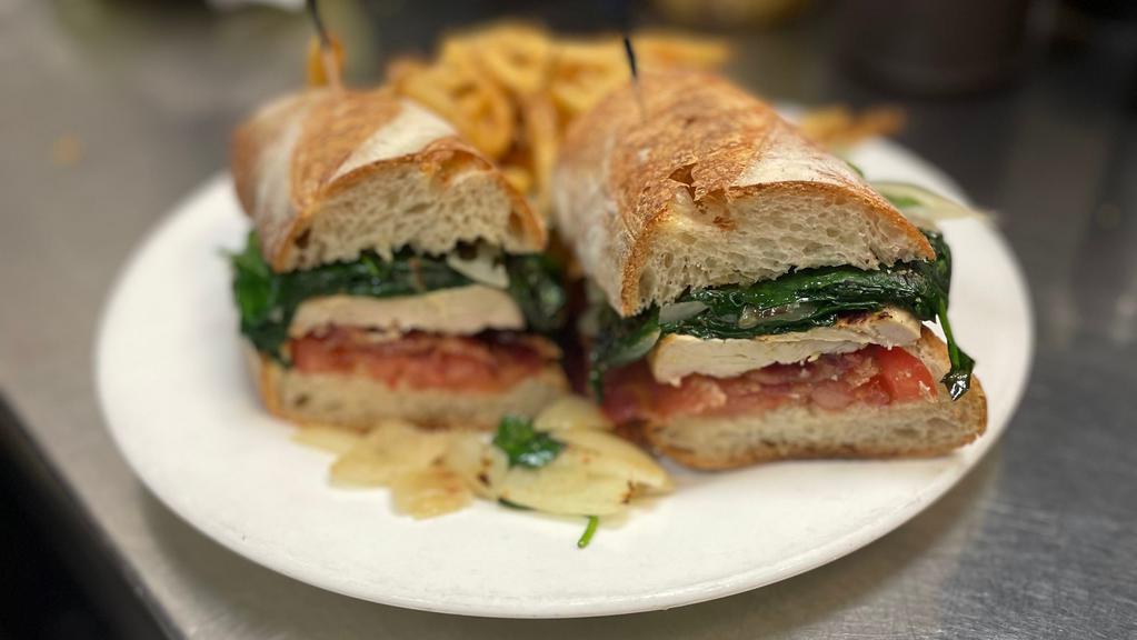 Grilled Chicken Sandwich · grilled chicken, sauteed spinach, onions, bacon & tomato, served on baguette (no side)