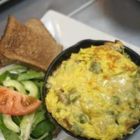 Frittata Special · roasted vegetable of the day, bacon & potatoes, whipped with 3 scrambled eggs, topped with a...