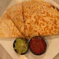 Chicken Quesadillas · diced chicken, cheddar & jack cheese, pico de gallo, in flour tortilla served with a side of...