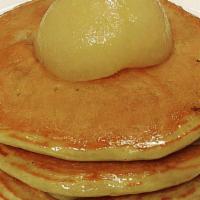 Poached Pear Pancakes · three (3) buttermilk pancakes, topped with house made caramel sauce, poached Bartlett pear