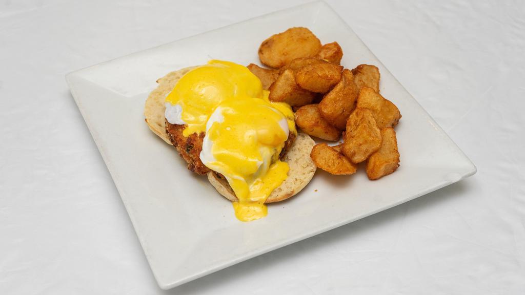 Crab Cake Benedict · crab cake served over toasted english muffin, topped with 2 sunny side up eggs & hollandaise