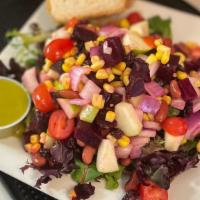 Sweet Green Salad · beets, granny smith apples, sweet yellow corn, red beans, cherry tomatoes, craisins & red on...