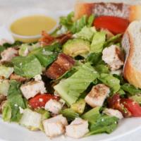 Cobb Salad · Grilled chicken, lettuce, tomato, applewood smoked bacon, avocado, crumbled gorgonzola chees...