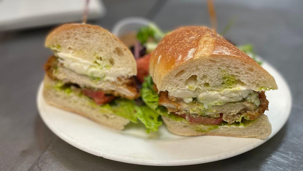 Classic Cutlet · Buttermilk fried chicken cutlet, fresh mozzarella, pesto mayo, lettuce and tomato on baguette.