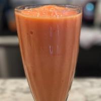 Tropical Breeze Smoothie · frozen pineapple, strawberries and mangos blended with orange juice