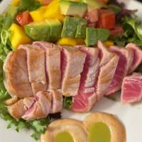 Yellowfin Tuna Salad (Gf) · Seared sushi grade tuna with a chipotle, cilantro and lime sauce, mixed greens, mango, avoca...