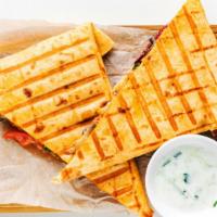 Bbq Cheese Quesadilla · Hot off the griddle, mouthwatering quesadilla made with a fine blend of cheeses, peppers, an...