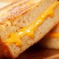 Cheddar Grilled Cheese Sandwich · Delicious sandwich made with Cheddar cheese, and customer's choice of bread. Topped with but...