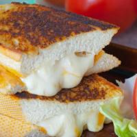 Swiss Grilled Cheese Sandwich · Delicious sandwich made with Swiss cheese, and customer's choice of bread. Topped with butte...