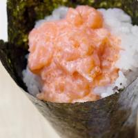 Spicy Scallop Handroll · Gluten free.  Chopped scallop, mayo, chili oil, and masago. (spicy).
