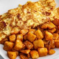 Greek Omelet · Feta cheese, tomato, and onion.