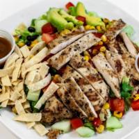 Fresh Stop Salad · Grilled chicken, romaine, black beans, roasted corn, cucumbers, tomatoes, wontons, and avoca...