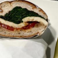 Caprese Sandwich · Fresh mozzarella, tomatoes, arugula, roasted tomatoes, and bruschetta.