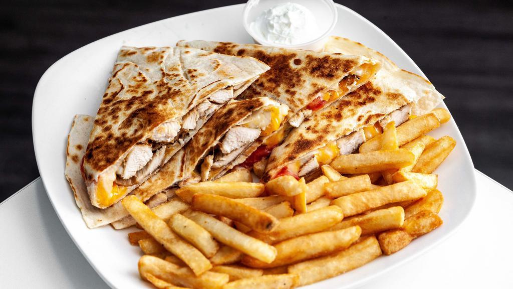 Chicken Quesadilla · Grilled chicken, tomatoes and Monterey Jack and Cheddar cheese.