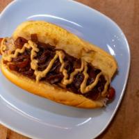 Frankies New Yorker · All beef dog with sauerkraut, caramelized onions and spicy brown mustard.