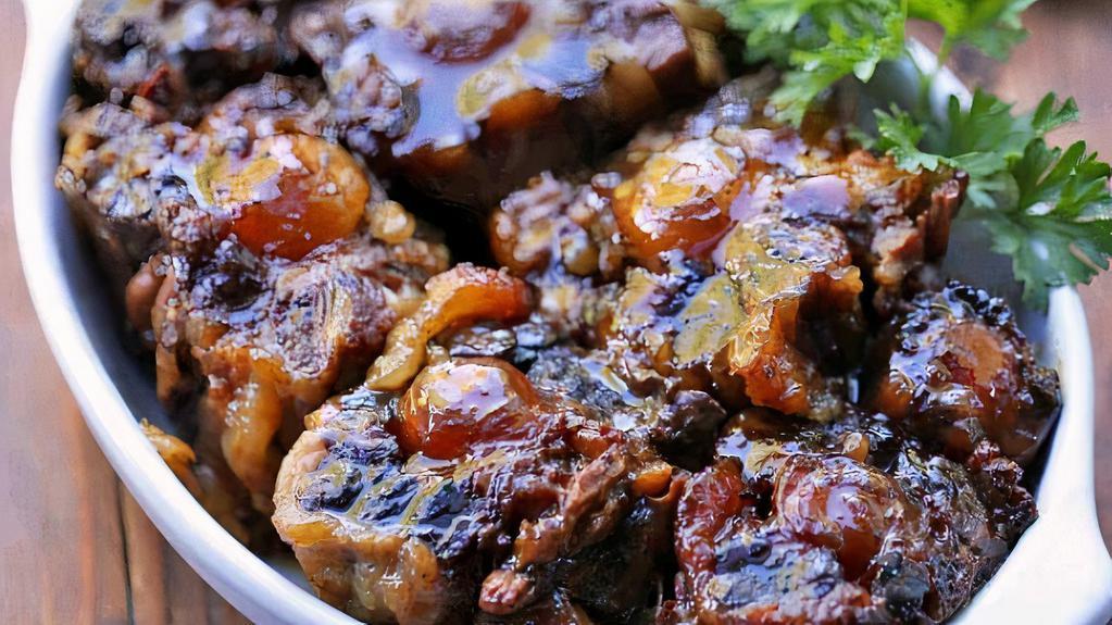 Oxtail · Stewed oxtail served over rice or other condiment