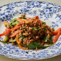 Pad Kra Pow · Ground pork or ground chicken ; sautéed garlic, bell pepper, basil leaves and fresh chili in...