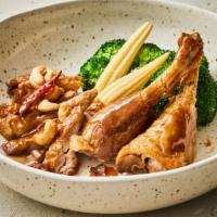 Ped Ma Kam · Crispy duck in tamarind sauce, with fried chili, fried onion, cashew nut and steamed mixed v...