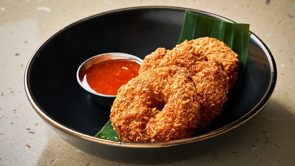 Tord Mun Goong · Deep fried shrimp cake served with sweet chili sauce.