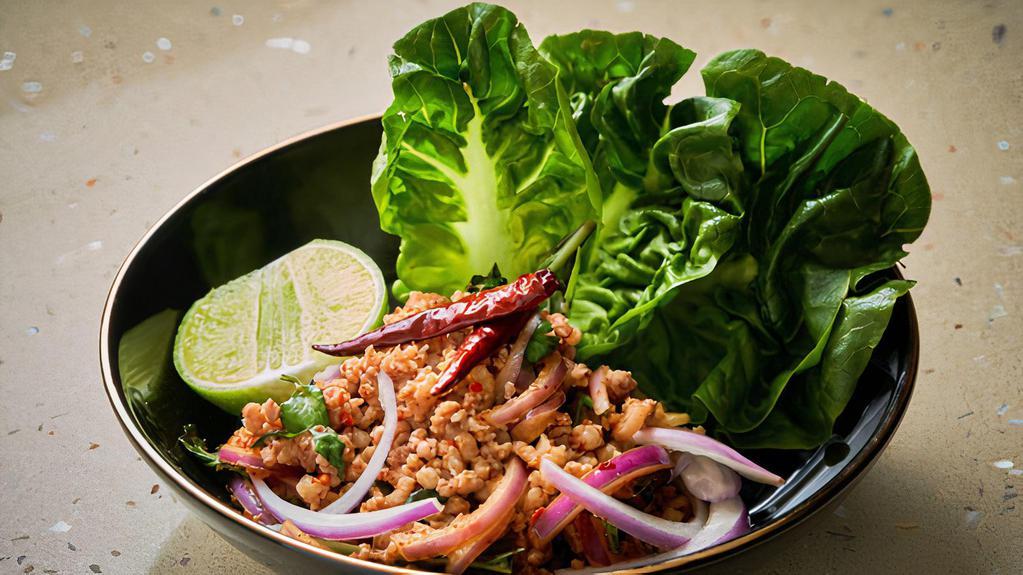 Labb Gai Or Labb Moo · Lettuce wrap ground chicken or ground pork seasoned with red onion, mint leaves, cilantro, chili and lime juice.