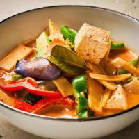 Gaeng Dang · Thai style red curry with bamboo shoot, basil leaves, carrot, eggplant and bell pepper simme...