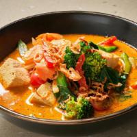 Gaeng Karee · Yellow curry paste with tomato, potato, bell pepper, carrot, and onion simmered in coconut m...