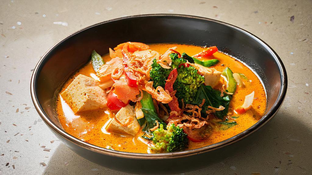Gaeng Karee · Yellow curry paste with tomato, potato, bell pepper, carrot, and onion simmered in coconut milk.