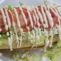 Flautas · Fried rolled tortillas with chicken, potatoes, or cheese, topped with lettuce, sour cream, c...