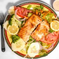 Fresh Norwegian Salmon Steak Salad · Fresh grilled salmon served with broccoli over with romaine lettuce, tomatoes, carrots, and ...
