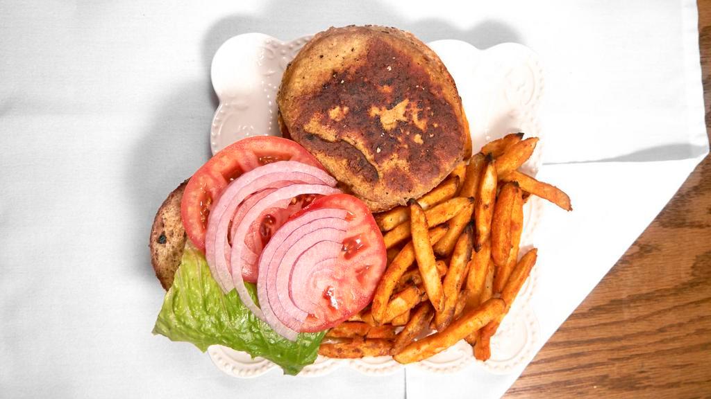 Texas Style Turkey Burger · With grilled onions, low-fat bbq sauce, and low-fat American cheese in a whole wheat pita. Served with lettuce, tomato, onion, and baked air fries.